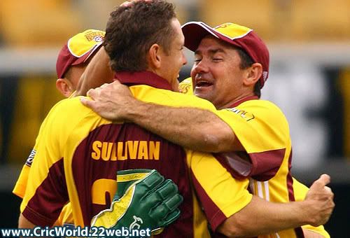 Jimmy Maher and Grant Sullivan celebrate a wicket