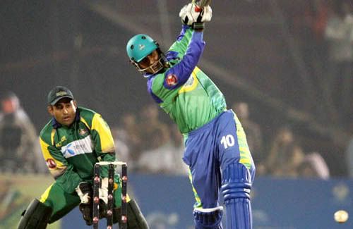 Abdul Razzaq steps out but mistimes the shot Abdul Razzaq steps out but mistimes the shot