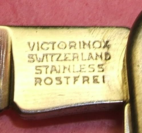 74mm Front, Front tang stamp from a 74mm Director. Same stamp on most all 74mm knives with a few exceptions.