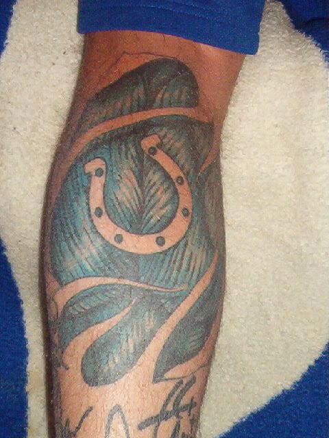 Filed under Black and Grey tattoos, Foot, Horseshoe, vine